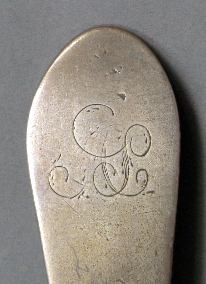 1962.0240.1093 Silver spoon engraving