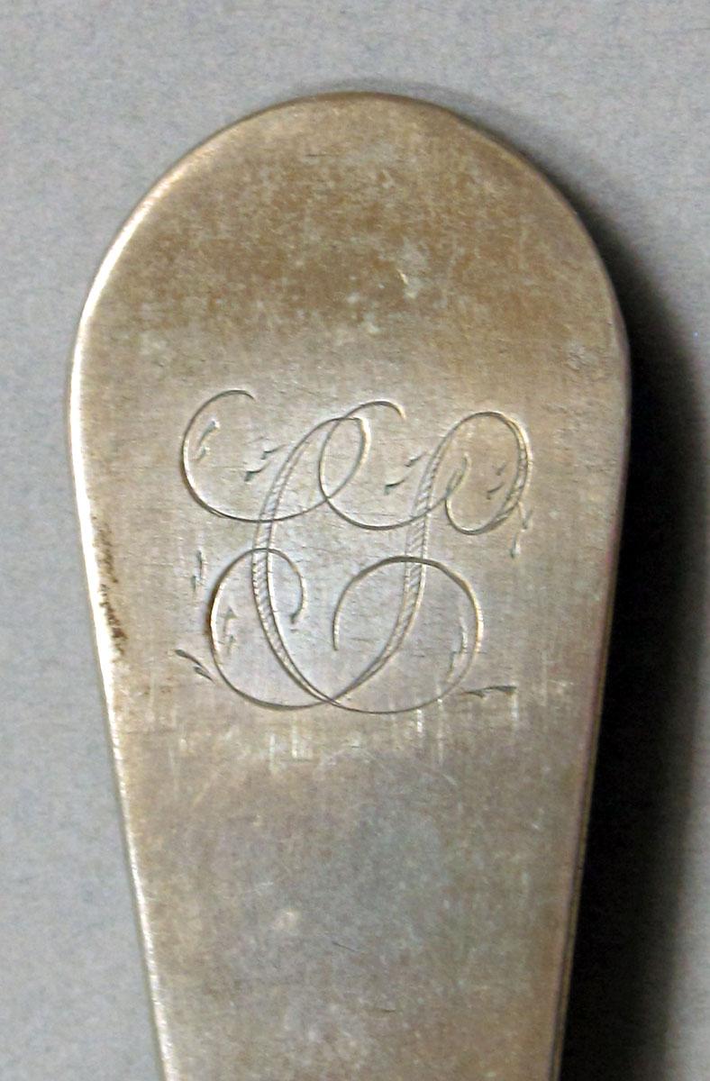 1962.0240.1094 Silver spoon engraving