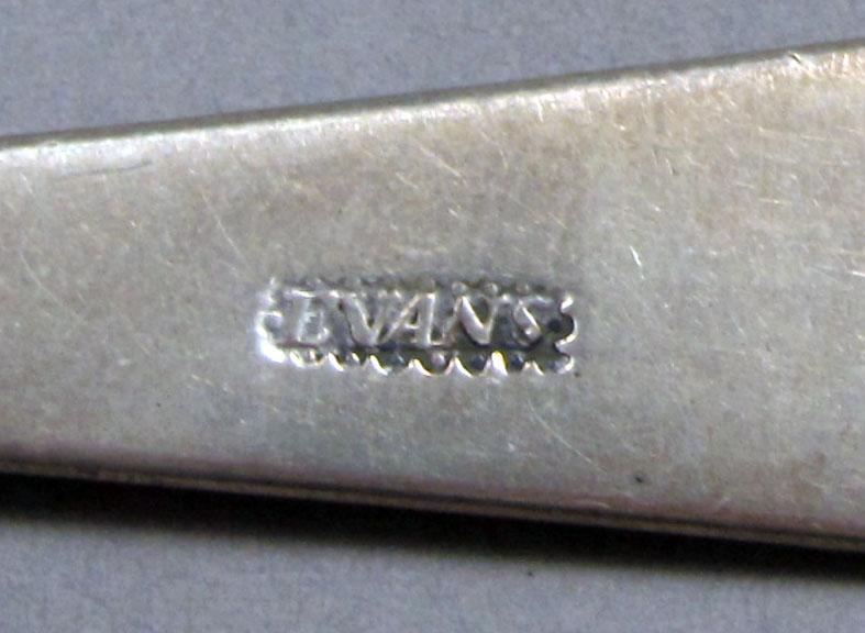 1962.0240.1094 Silver spoon mark