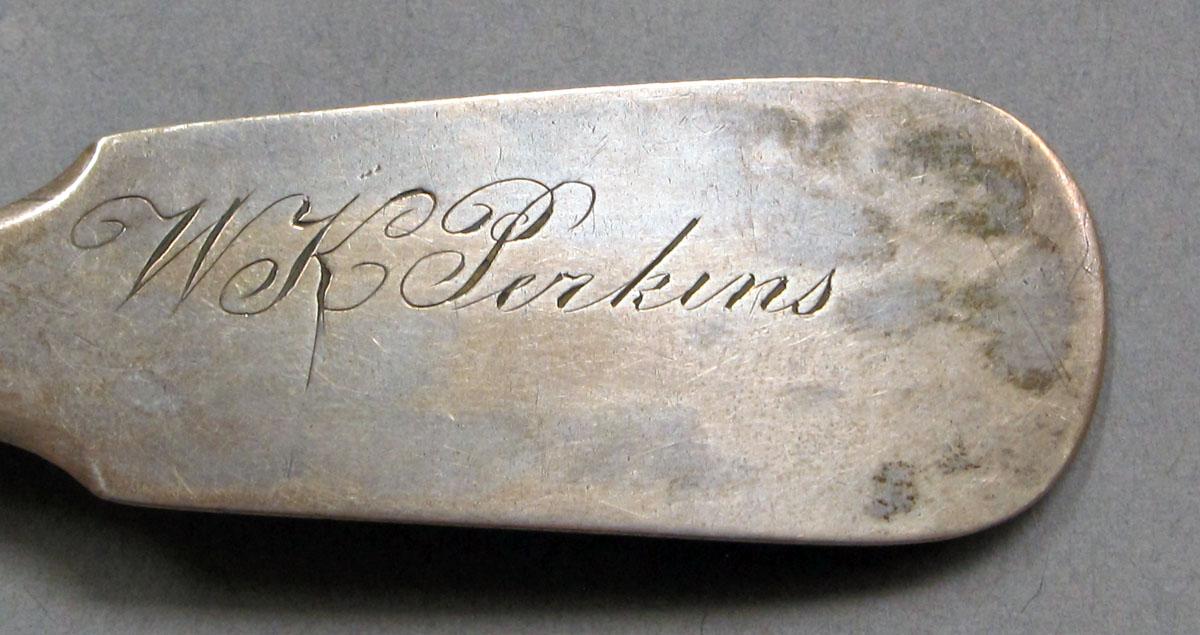 1962.0240.1097 Silver spoon engraving