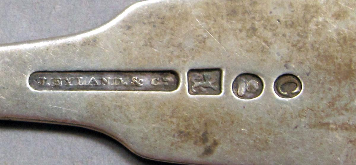1962.0240.1099 Silver spoon mark