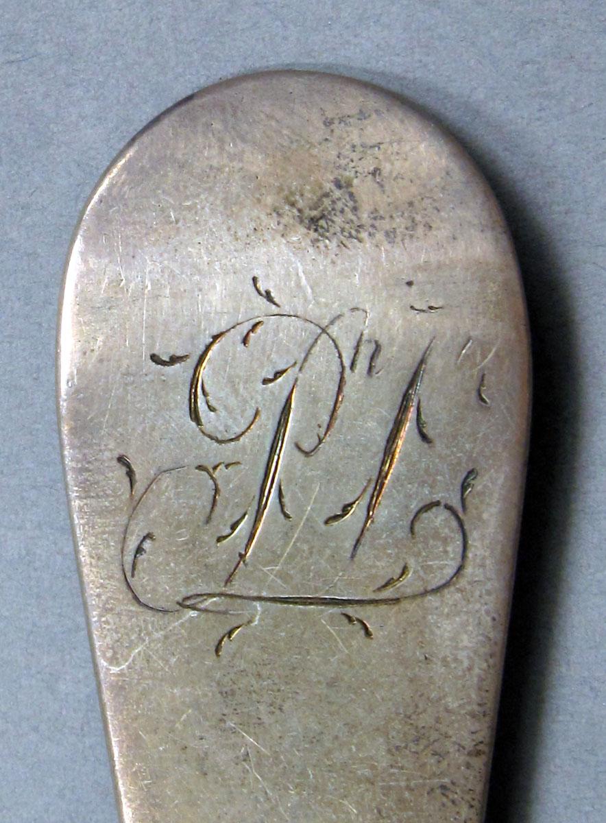 1962.0240.1100 Silver spoon engraving