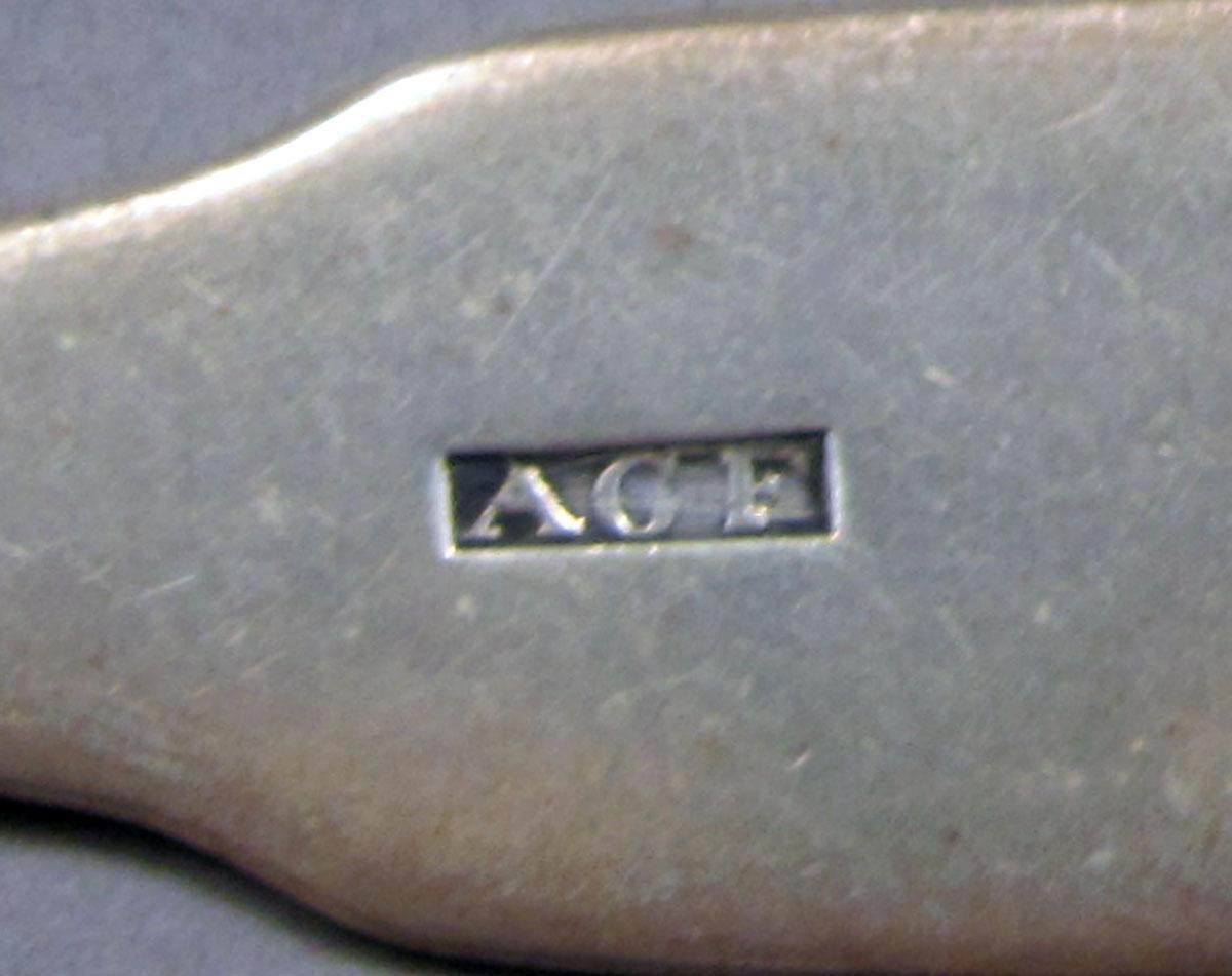 1962.0240.1102 Silver spoon mark