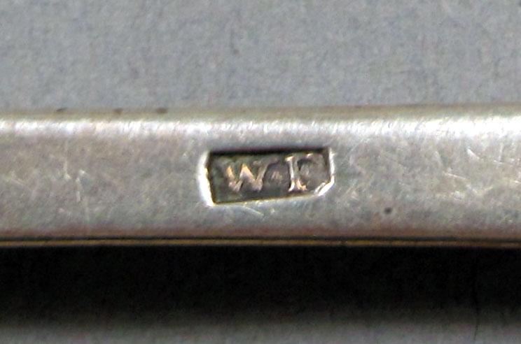1962.0240.1104 Silver spoon mark