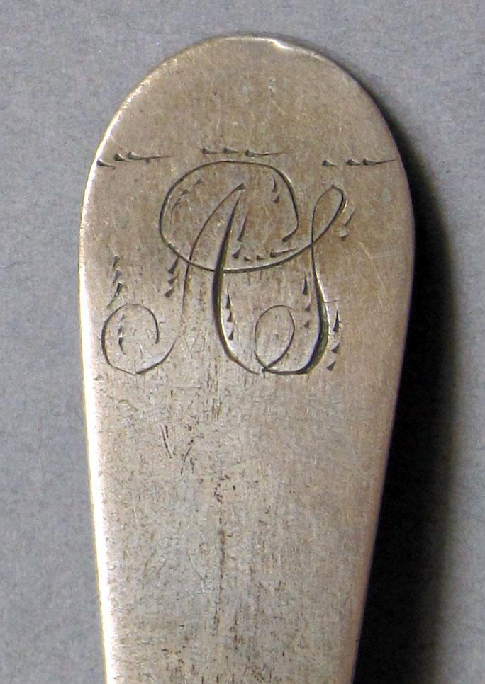 1962.0240.1106 Silver spoon engraving