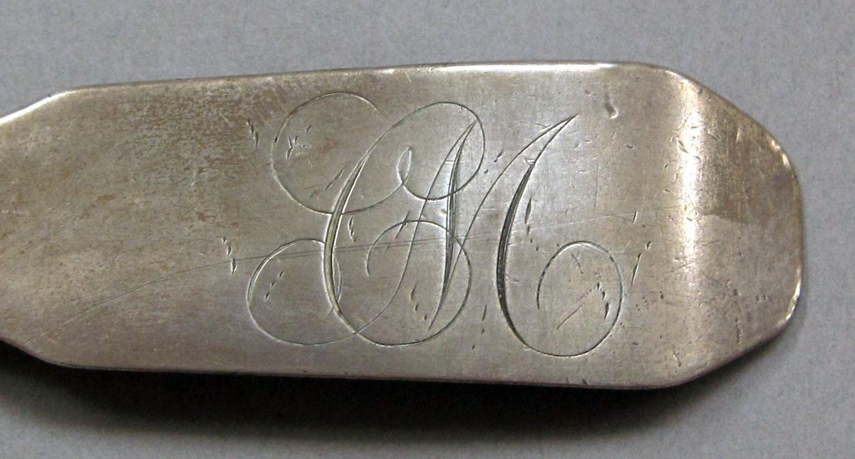 1962.0240.1108 Silver spoon engraving