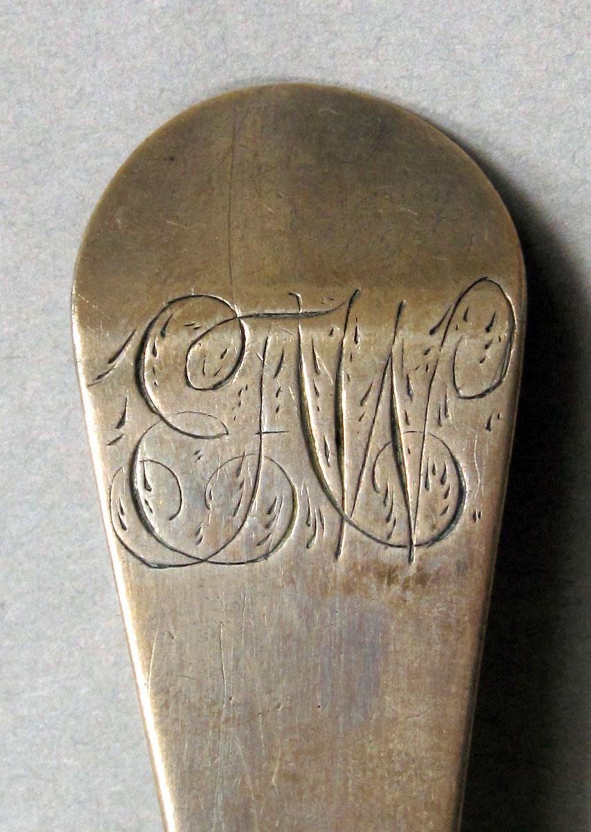 1962.0240.1109 Silver spoon engraving