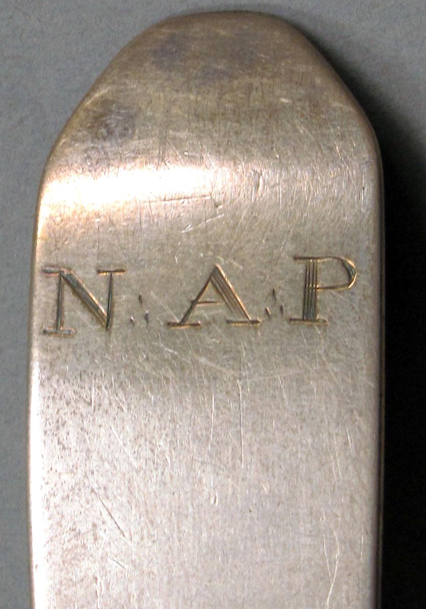 1962.0240.1115 Silver spoon engraving