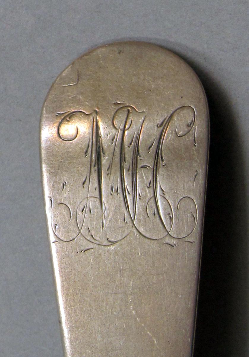 1962.0240.1126 Silver spoon engraving