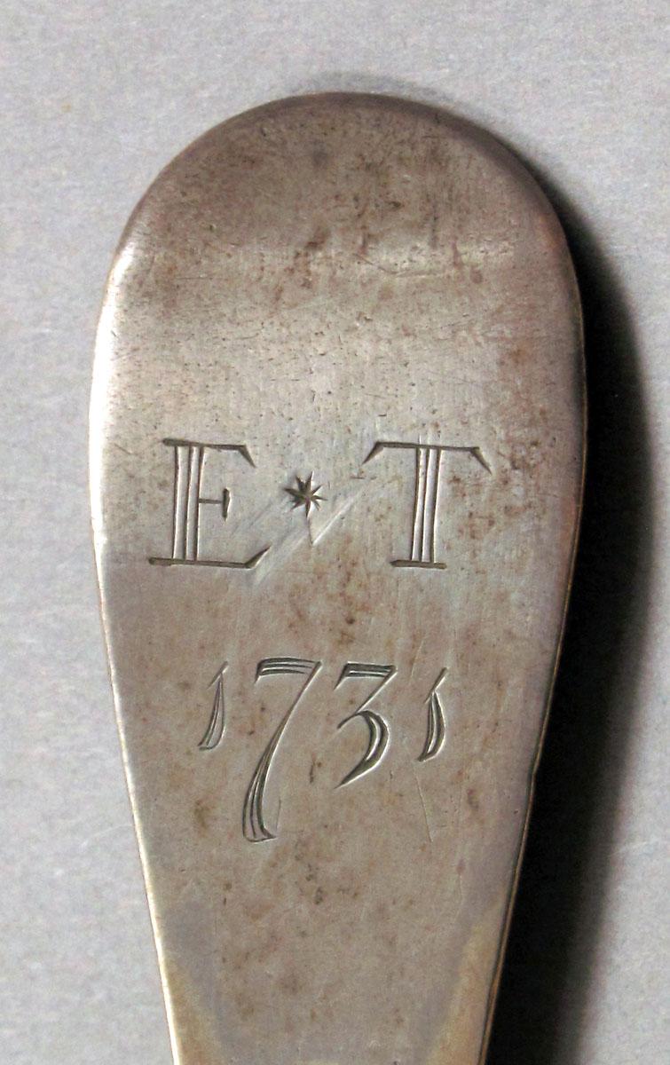 1962.0240.1127 Silver spoon engraving