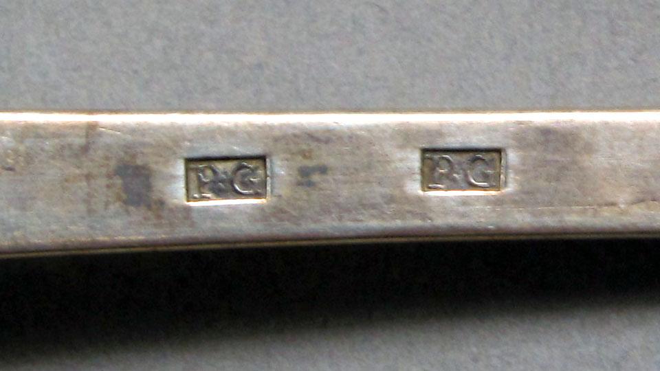 1962.0240.1128 Silver spoon mark