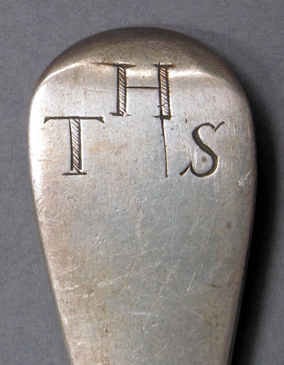 1962.0240.1131 Silver spoon engraving