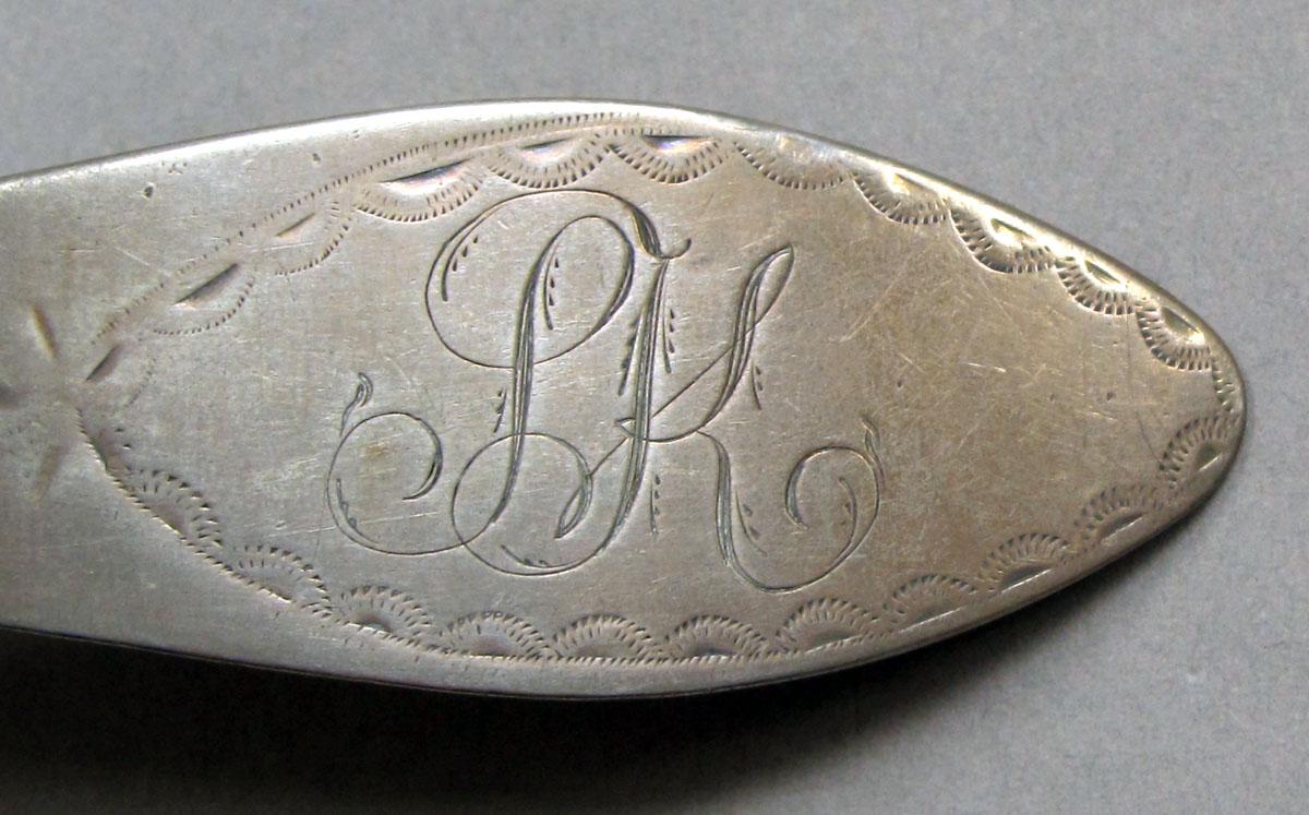 1962.0240.1137.001 Silver spoon engraving