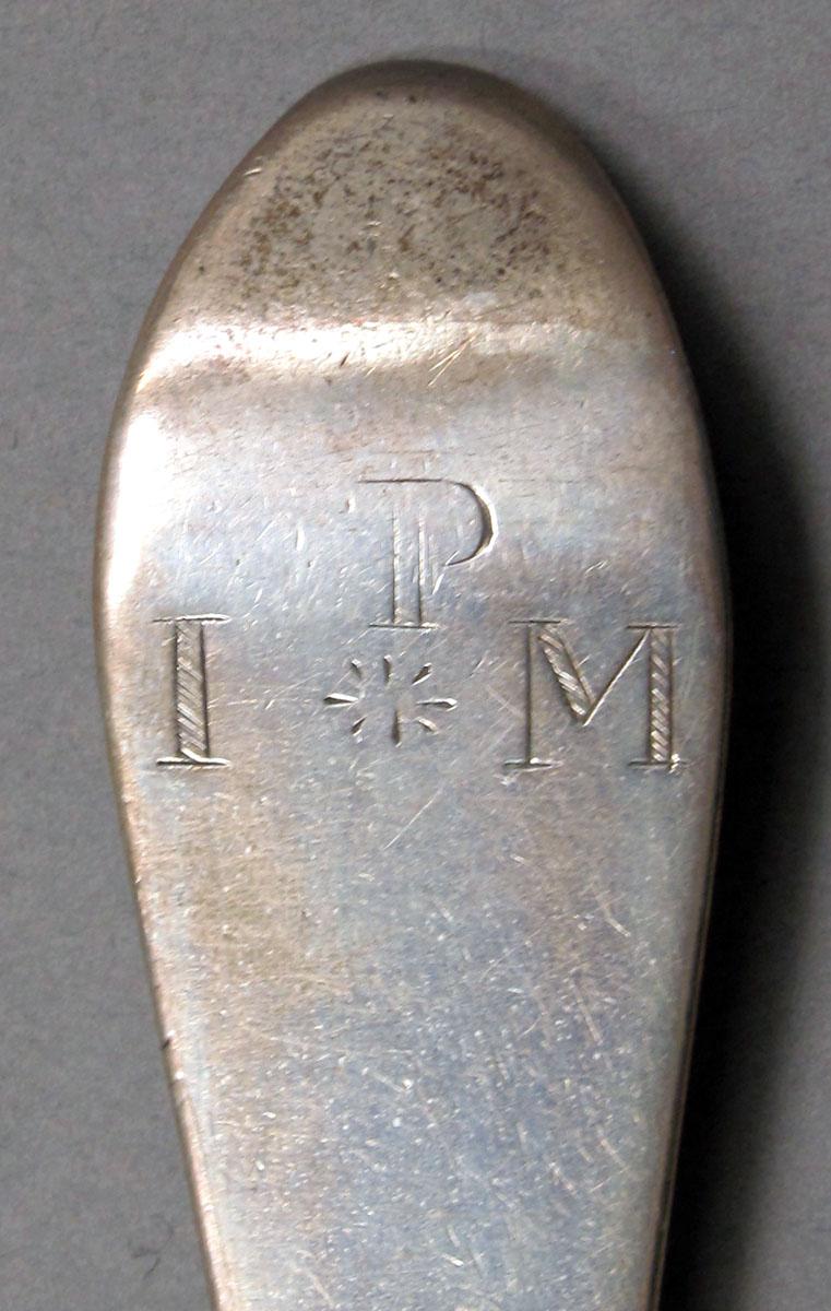 1962.0240.1138 Silver spoon engraving