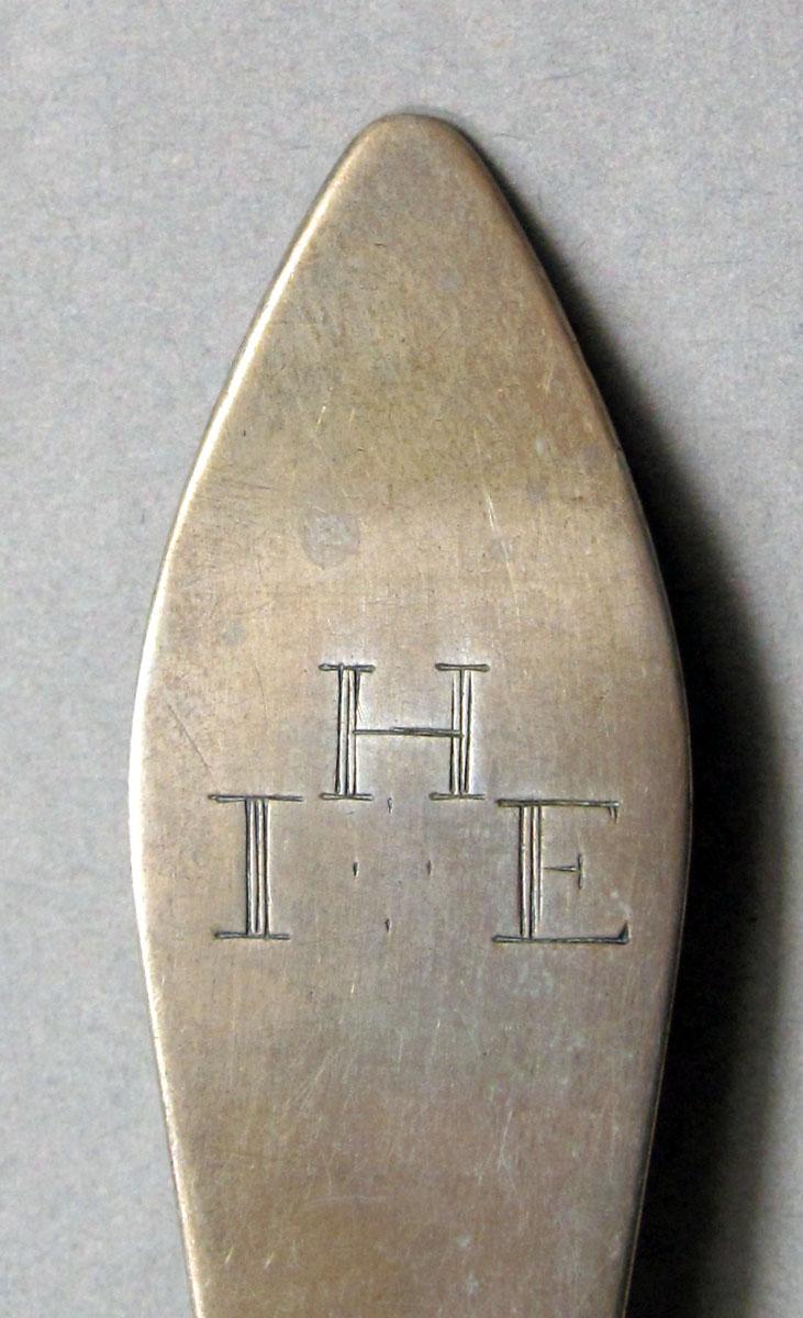 1962.0240.1141 Silver spoon engraving