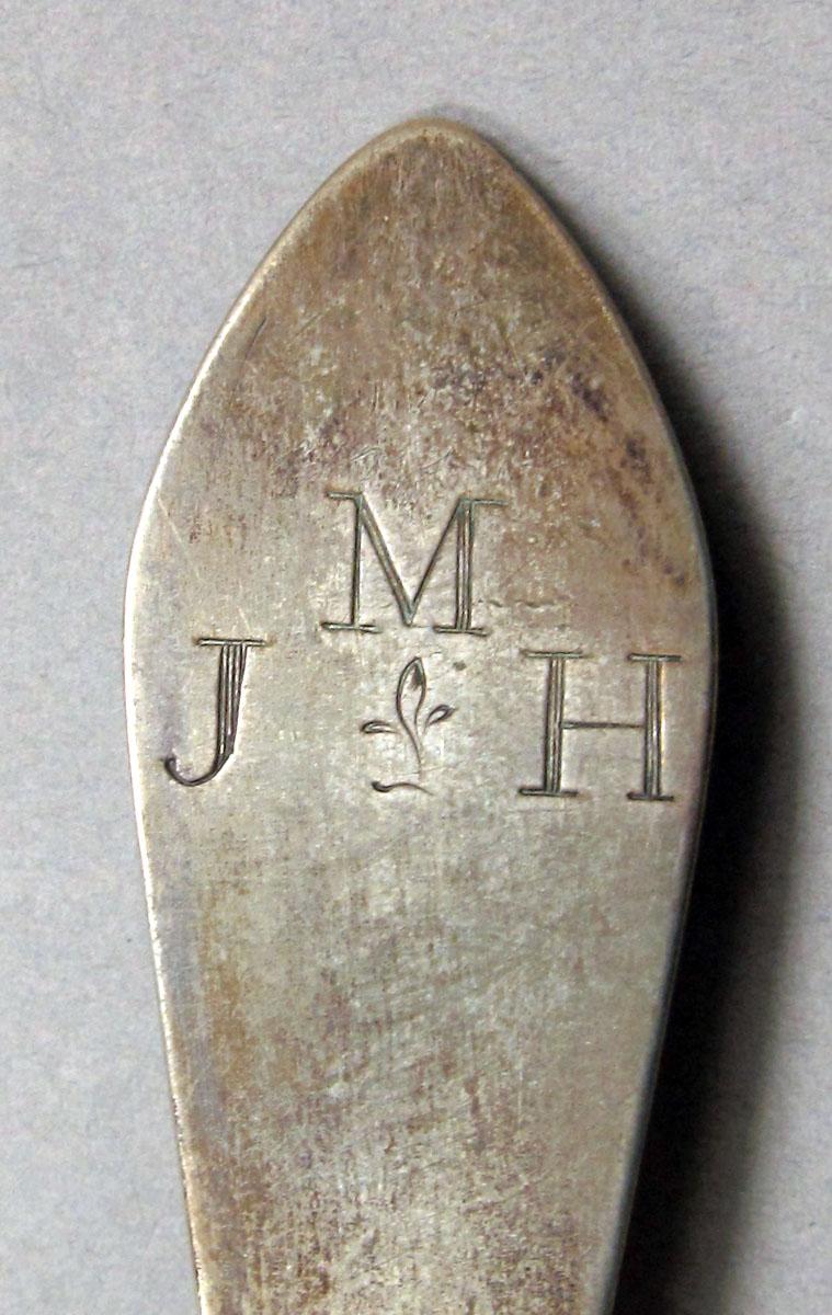 1962.0240.1142 Silver spoon engraving