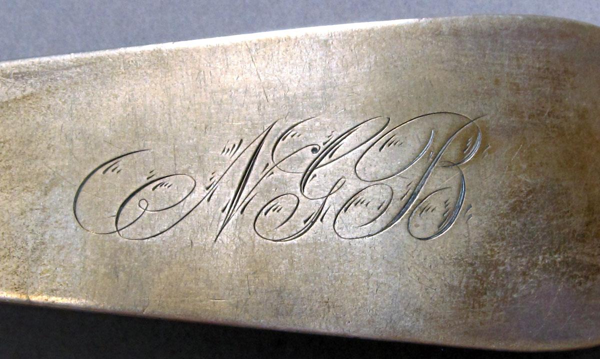 1962.0240.1183 Silver spoon engraving