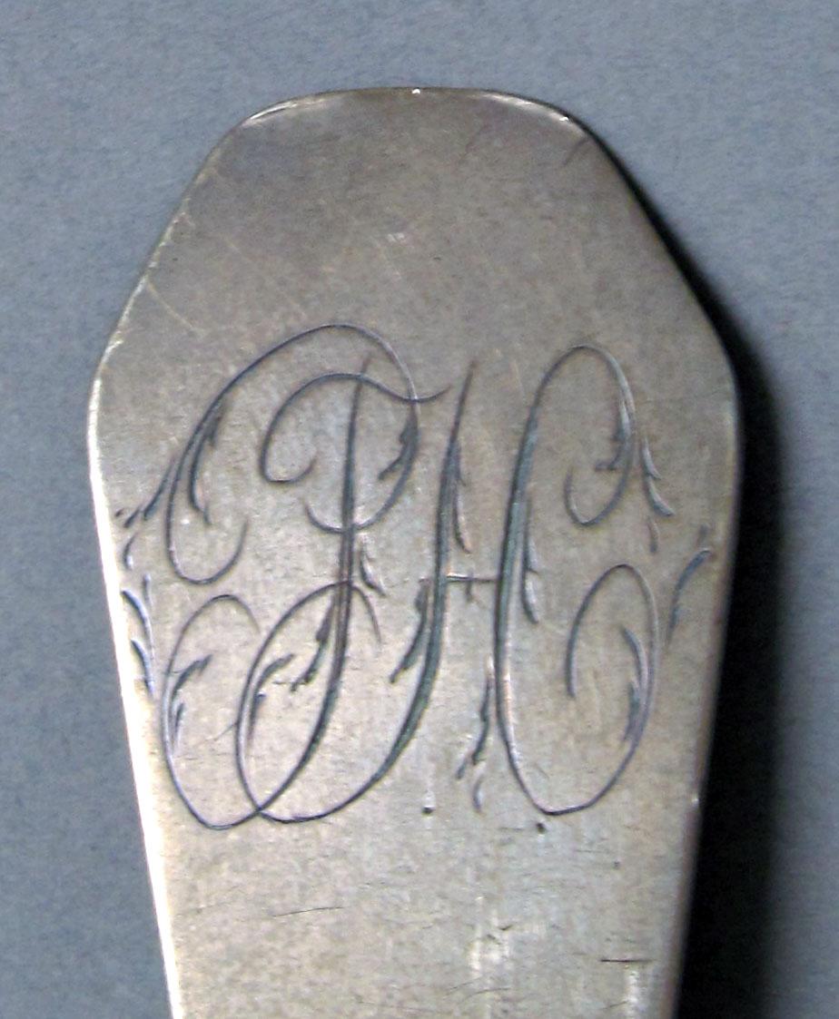 1962.0240.1185 Silver spoon engraving