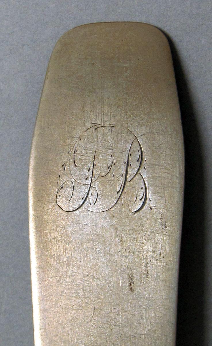 1962.0240.1189 Silver spoon engraving