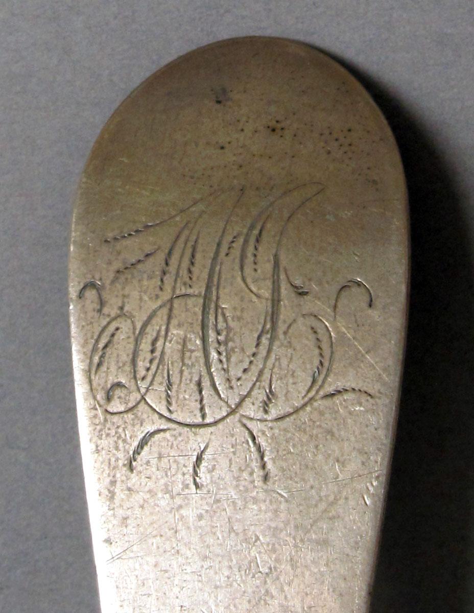 1962.0240.1191 Silver spoon engraving
