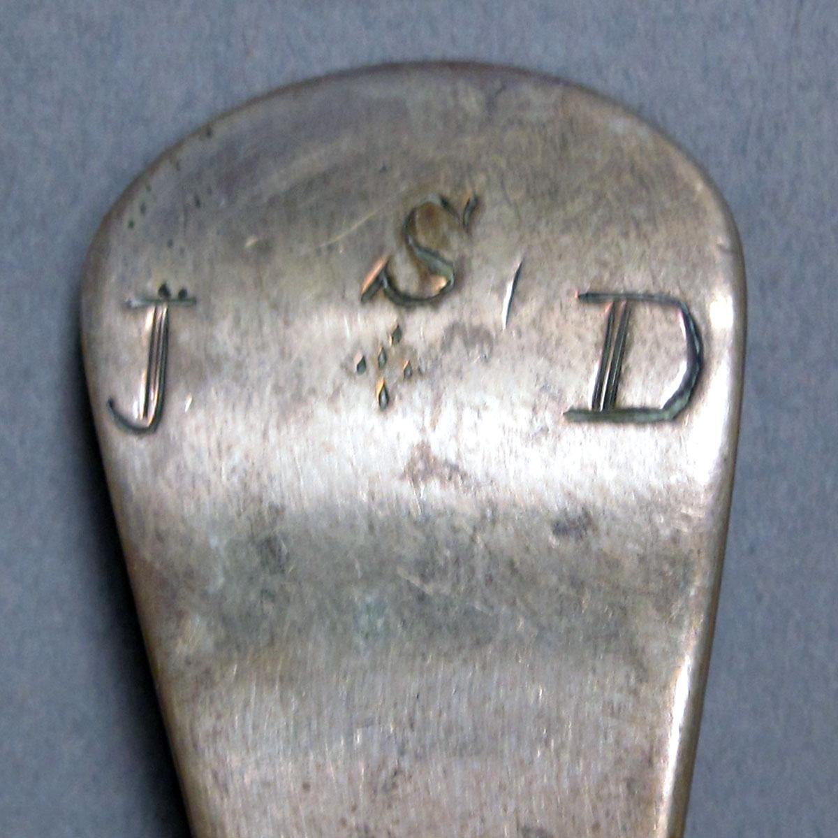 1962.0240.1194 Silver spoon engraving
