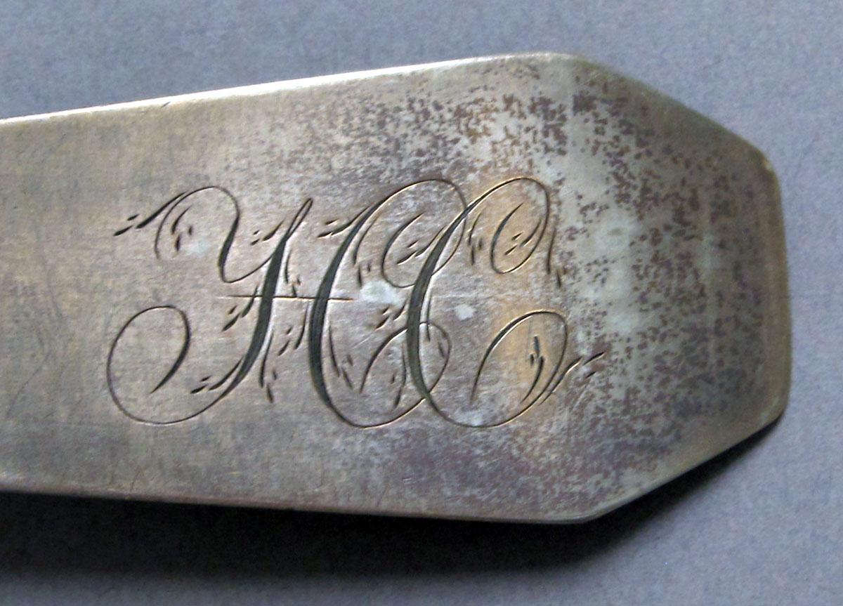 1962.0240.1195 Silver spoon engraving