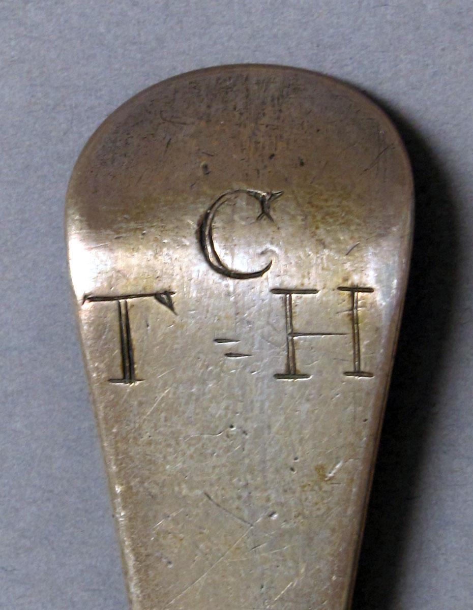 1962.0240.1196 Silver spoon engraving