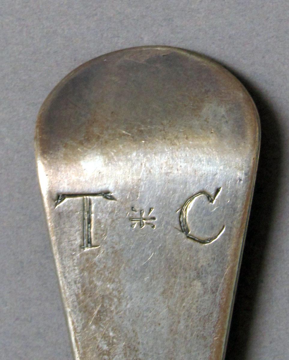 1962.0240.1197 Silver spoon engraving