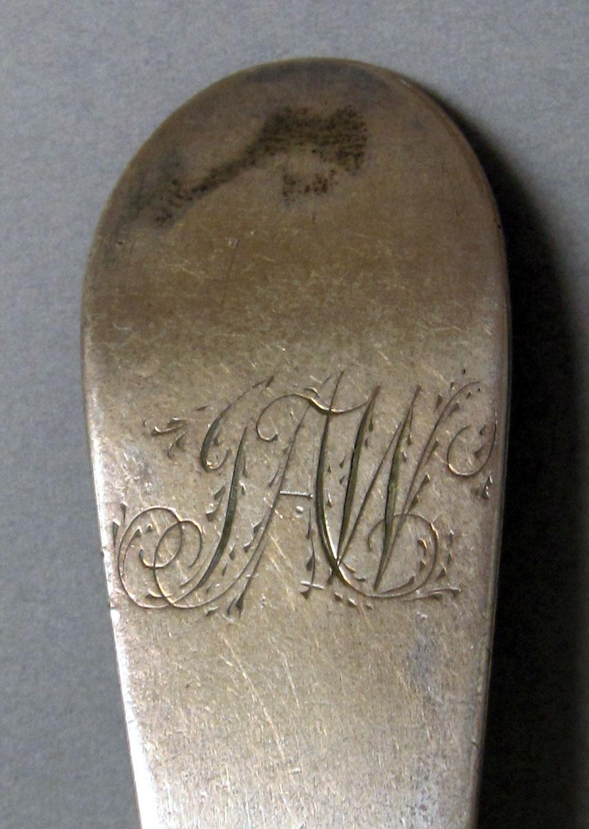 1962.0240.1202 Silver spoon engraving