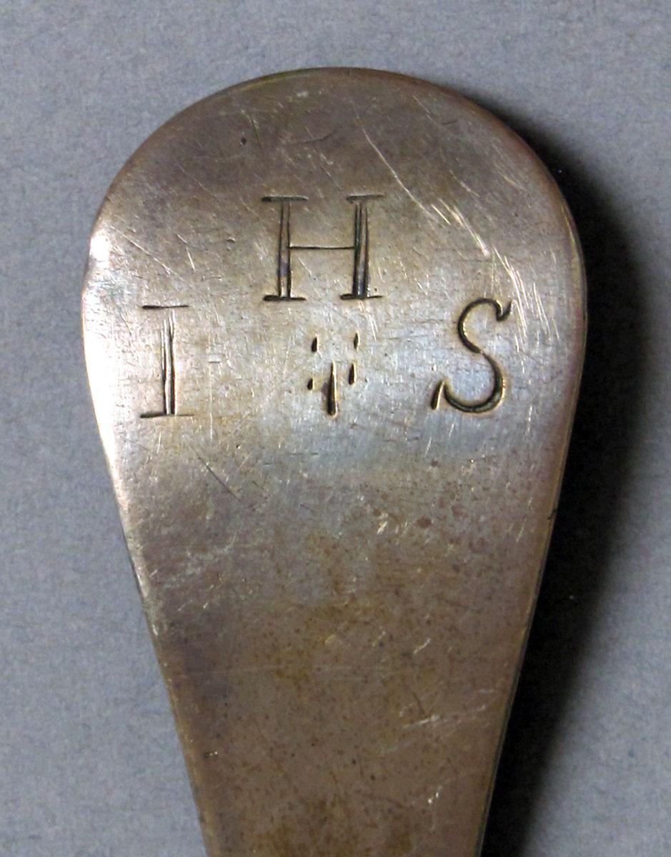 1962.0240.1203 Silver spoon engraving
