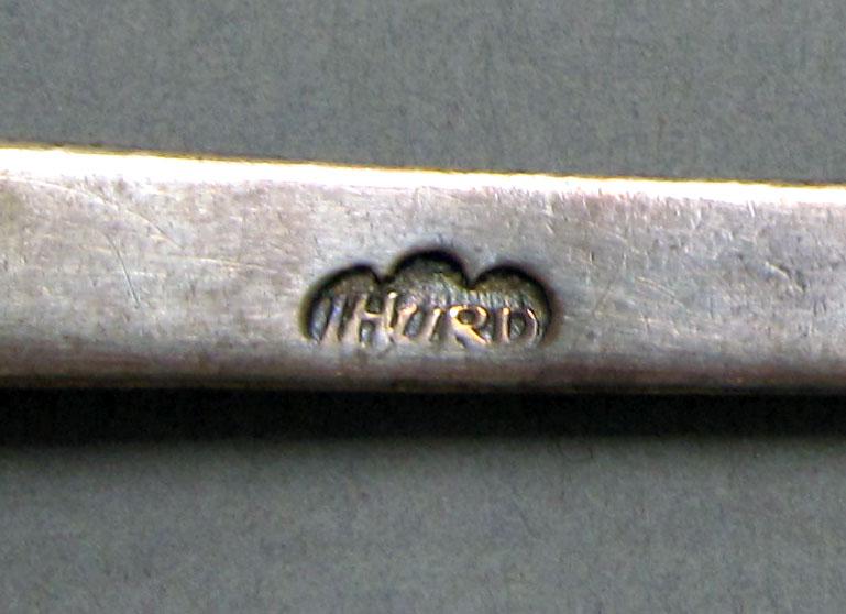 1962.0240.1204 Silver spoon mark