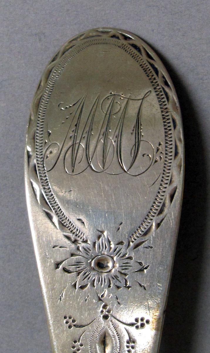 1962.0240.1207.001 Silver spoon engraving