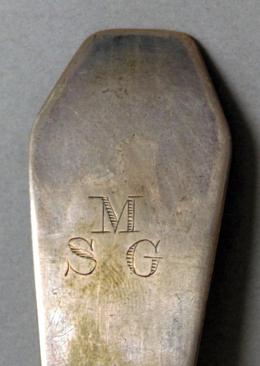 1962.0240.1209 Silver spoon engraving
