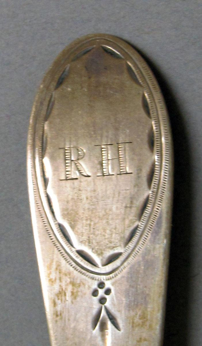 1962.0240.1210 Silver spoon engraving