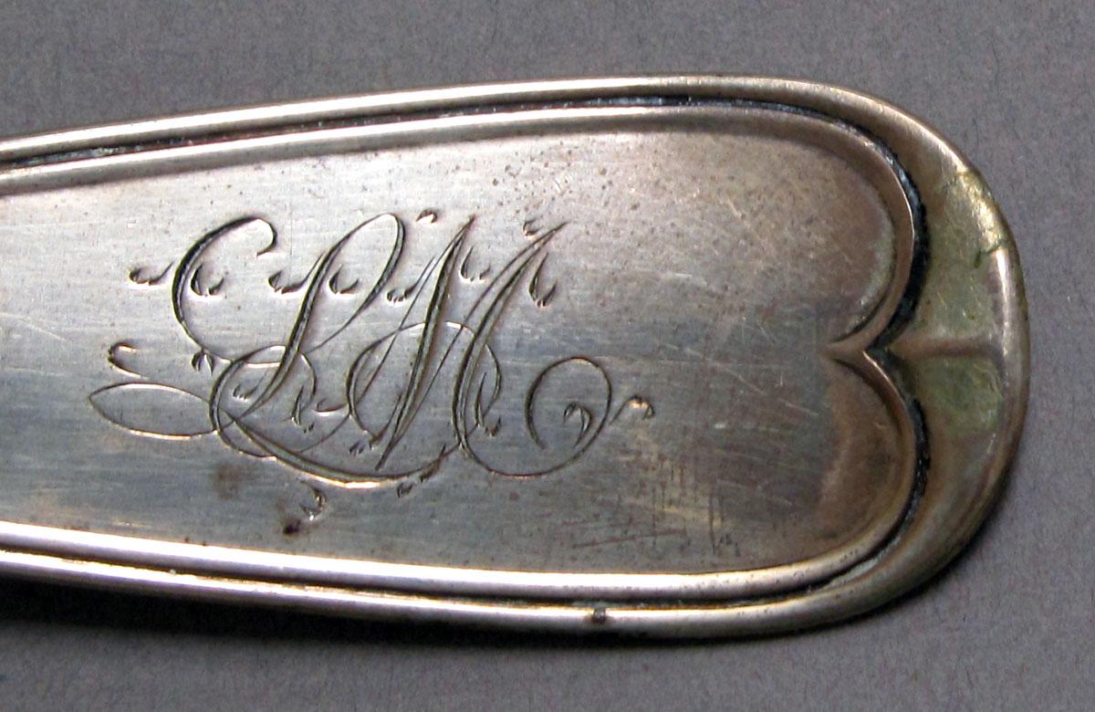 1962.0240.1214 Silver spoon engraving