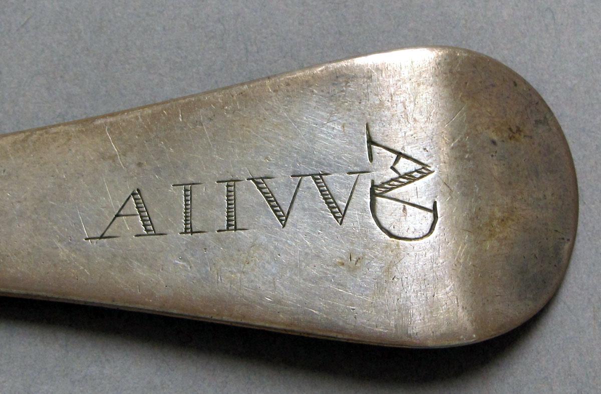 1962.0240.1215 Silver spoon engraving