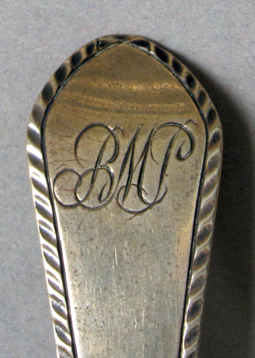 1962.0240.1216 Silver spoon engraving