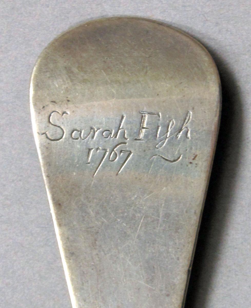 1962.0240.1220 Silver spoon engraving