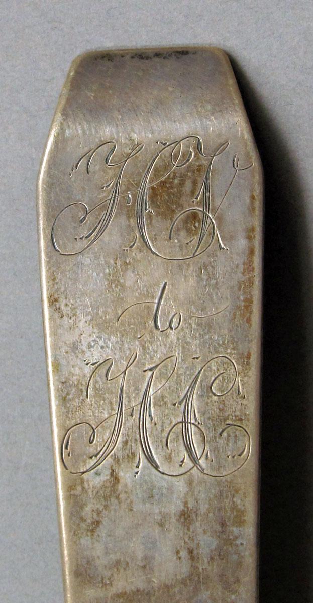 1962.0240.1224 Silver spoon engraving