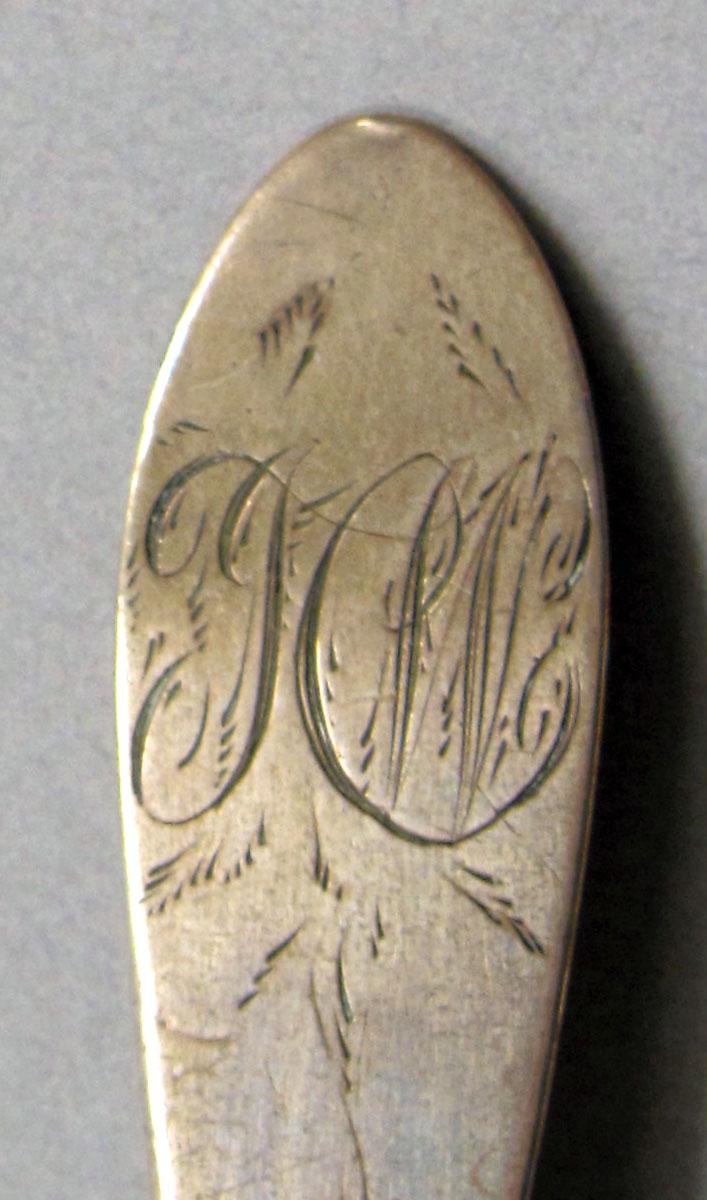 1962.0240.1225 Silver spoon engraving