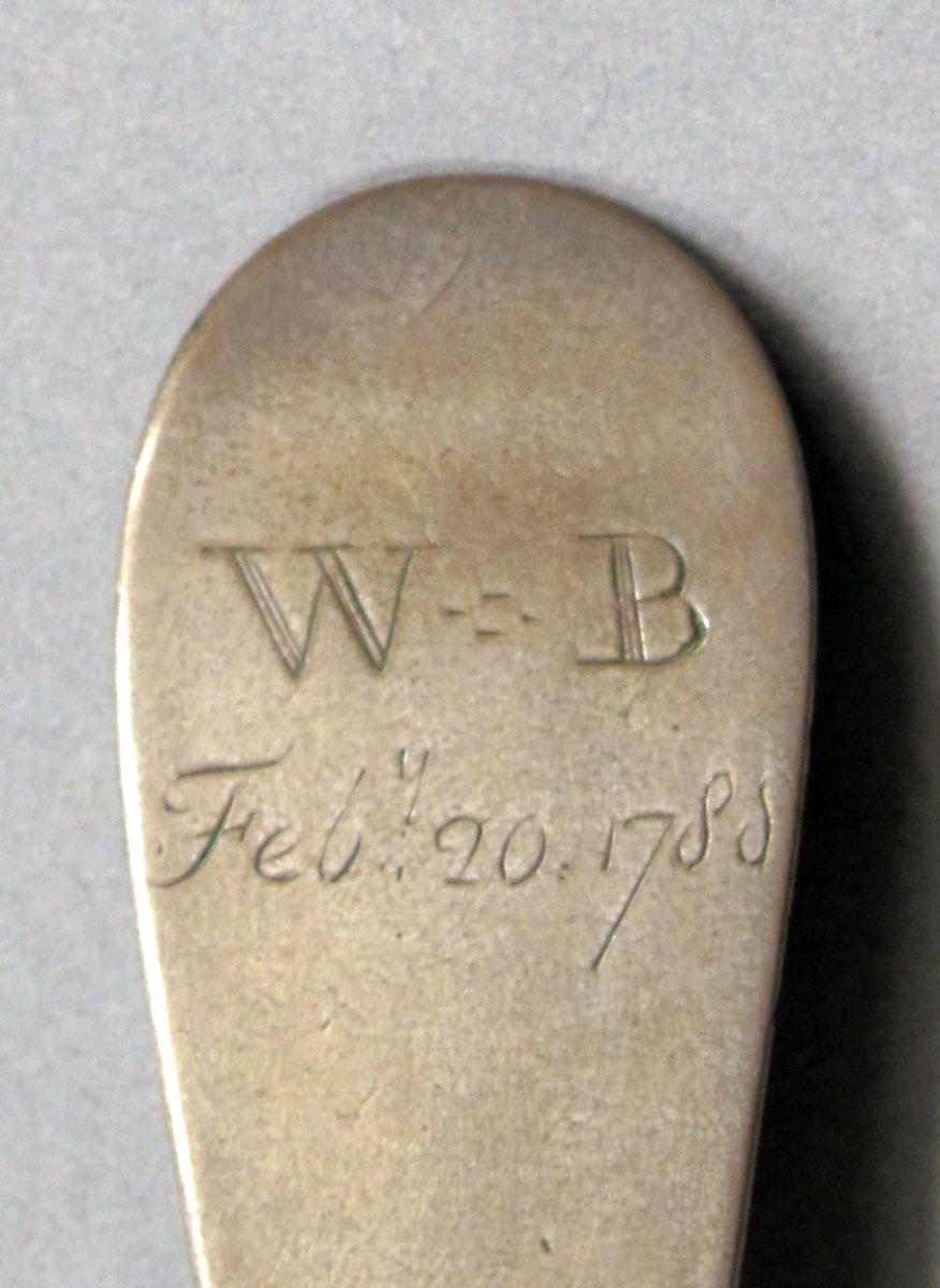 1962.0240.1226 Silver spoon engraving