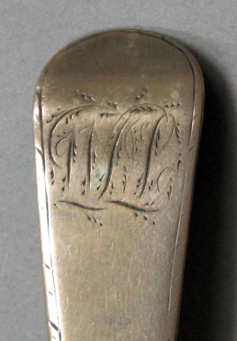 1962.0240.1230 Silver spoon engraving