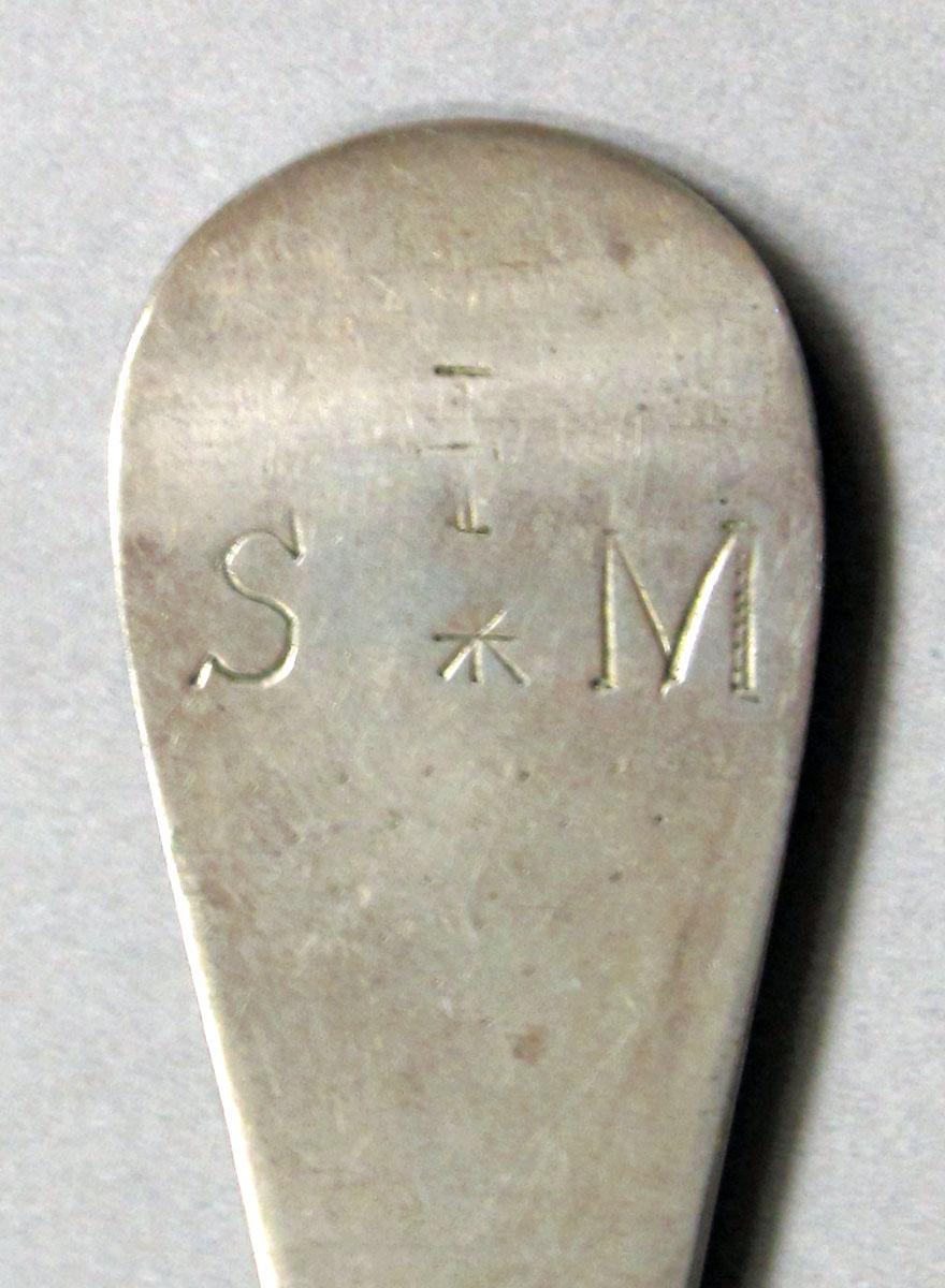 1962.0240.1235 Silver spoon engraving