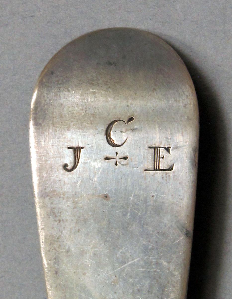 1962.0240.1236 Silver spoon engraving