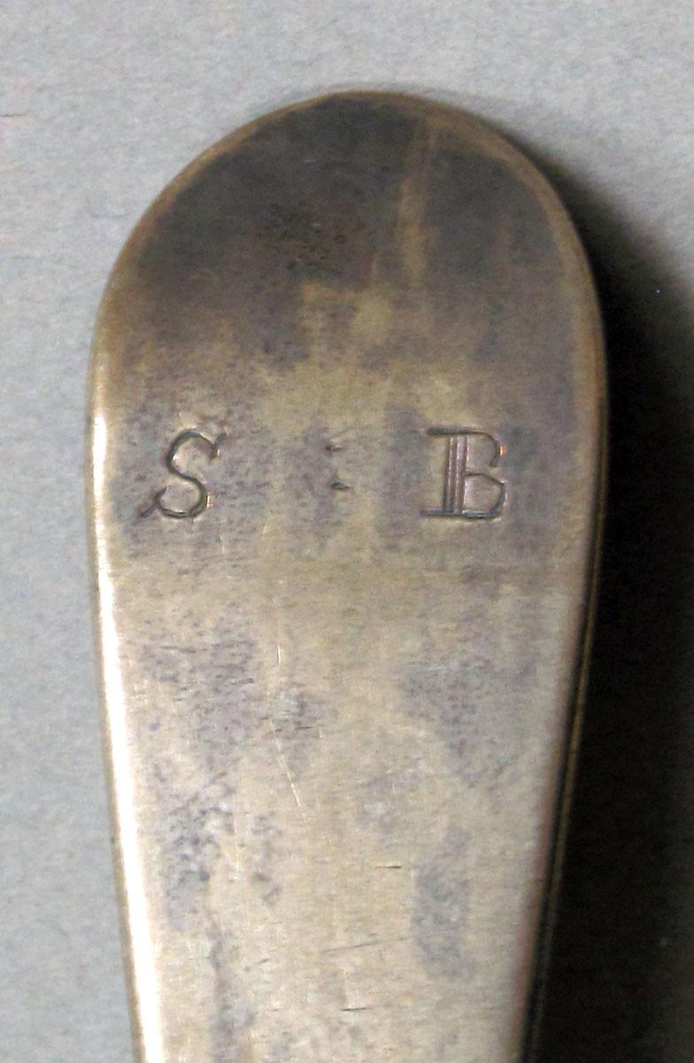 1962.0240.1238 Silver spoon engraving