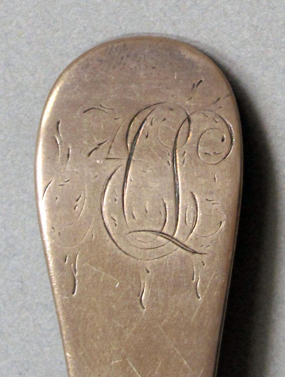1962.0240.1240 Silver spoon engraving