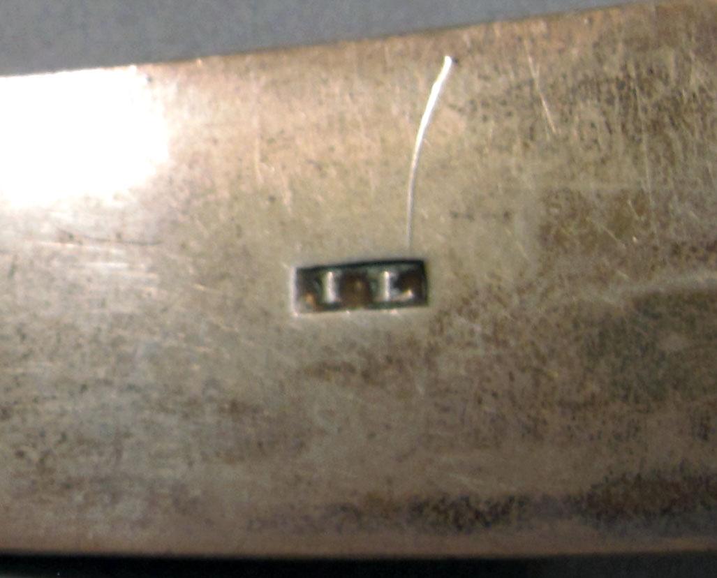 1962.0240.1242 Silver spoon mark