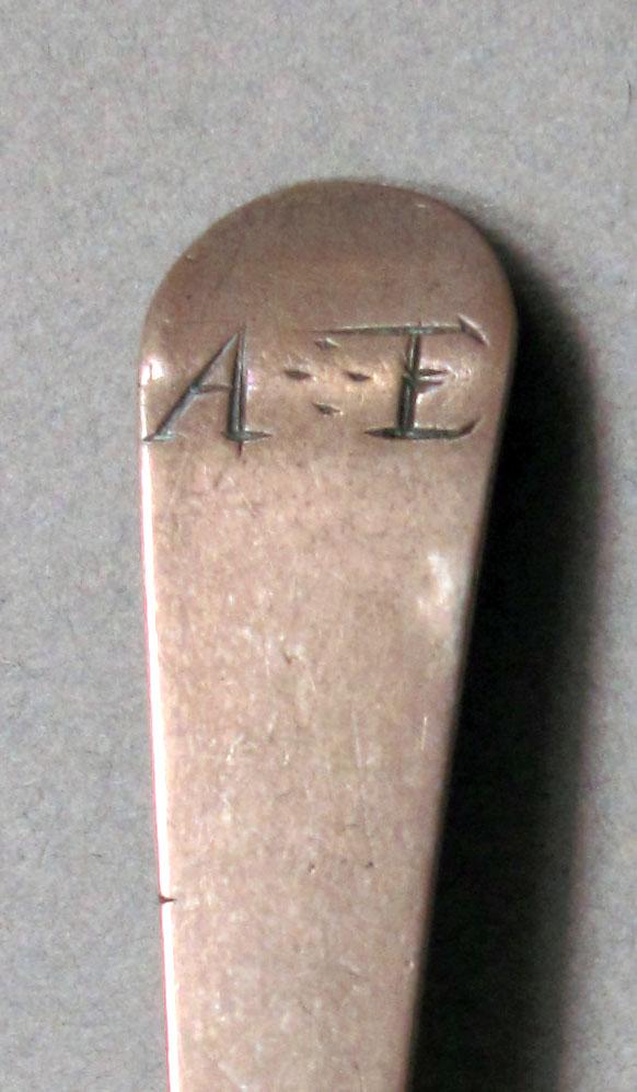 1962.0240.1244 Silver spoon engraving