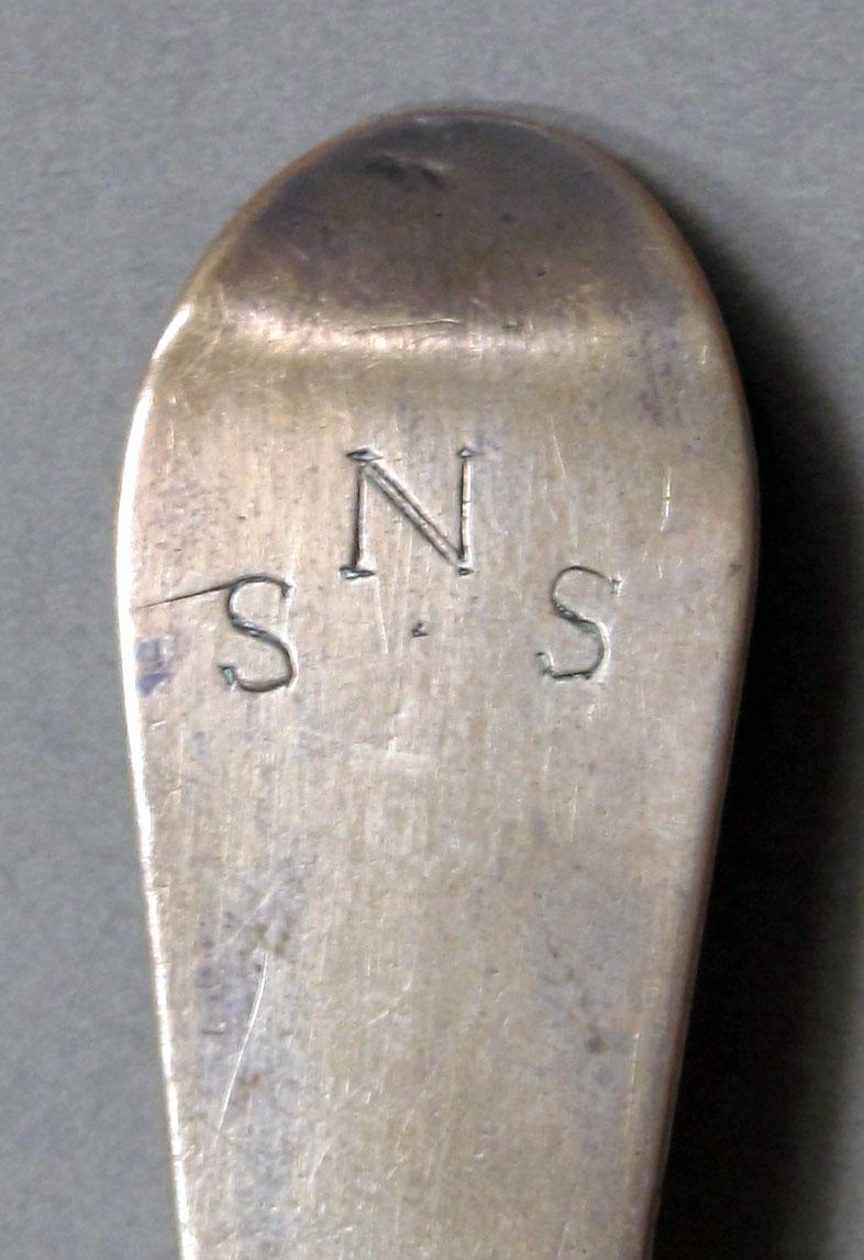 1962.0240.1245 Silver spoon engraving