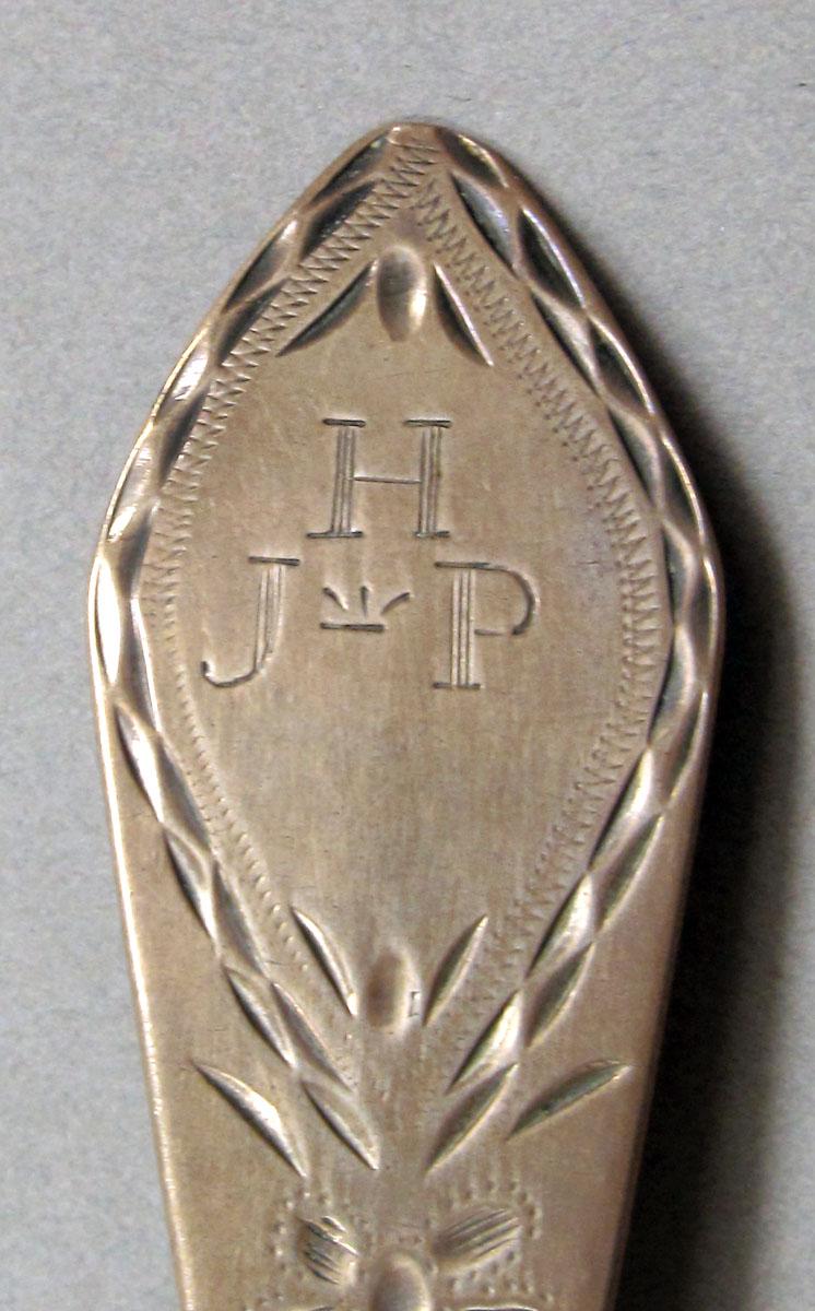 1962.0240.1251 Silver spoon engraving